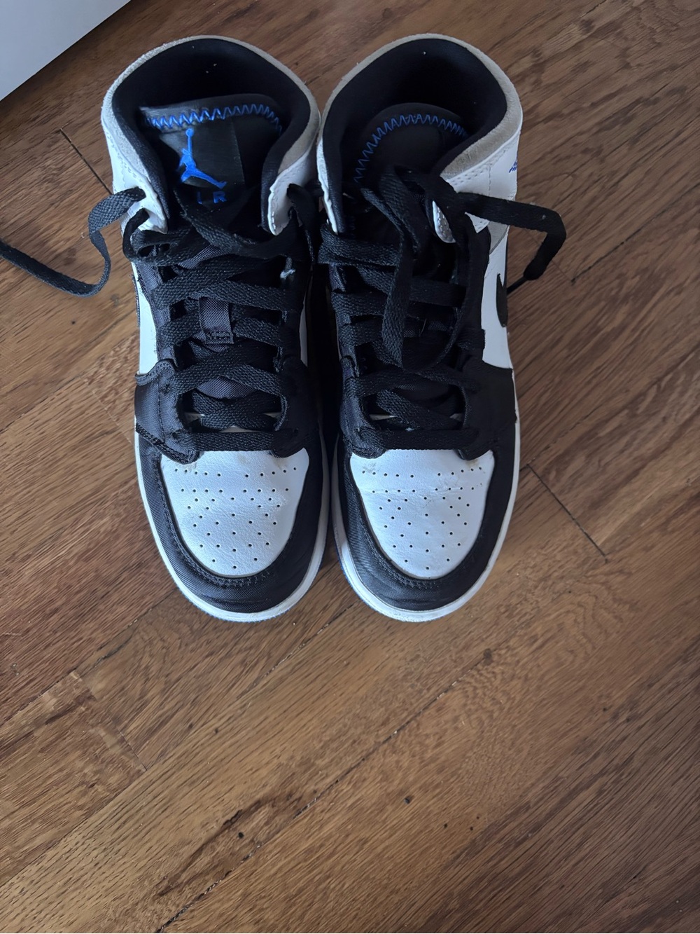 Nike Jordan 1s Kids Black, White and Blue Mid-Top Sneakers